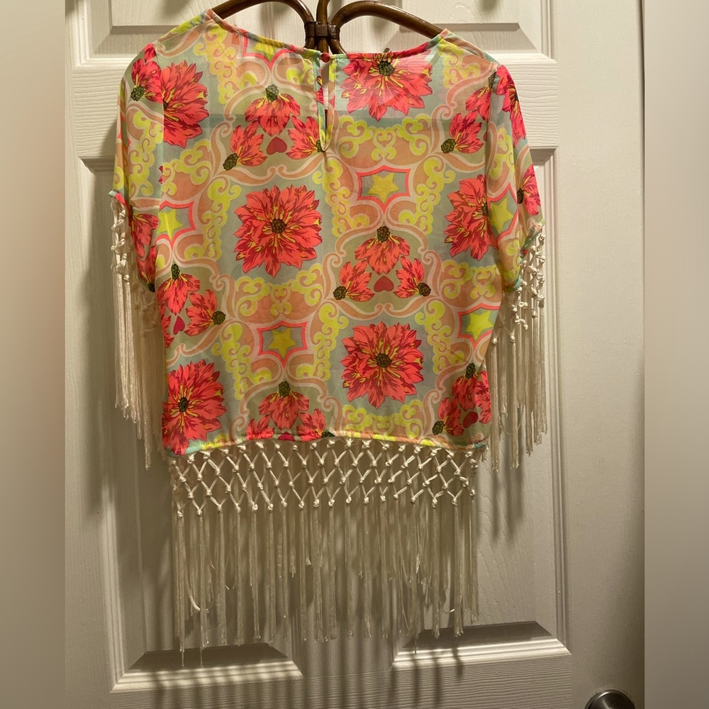 Very colorful vintage blouse with fringe!